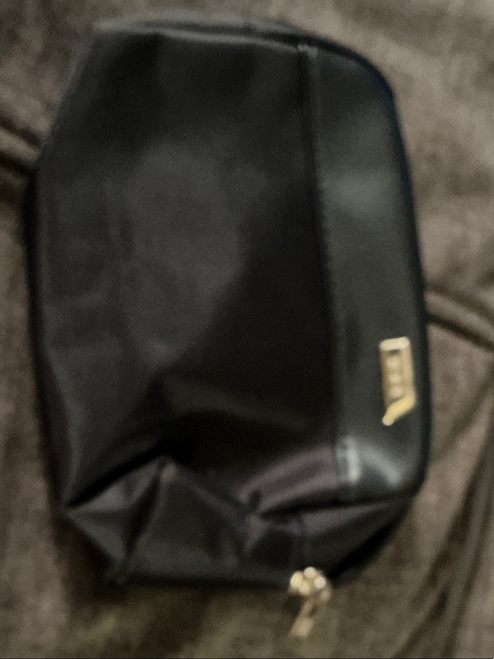 Tumi Black Men's Toiletry Pouch with Gold Accent